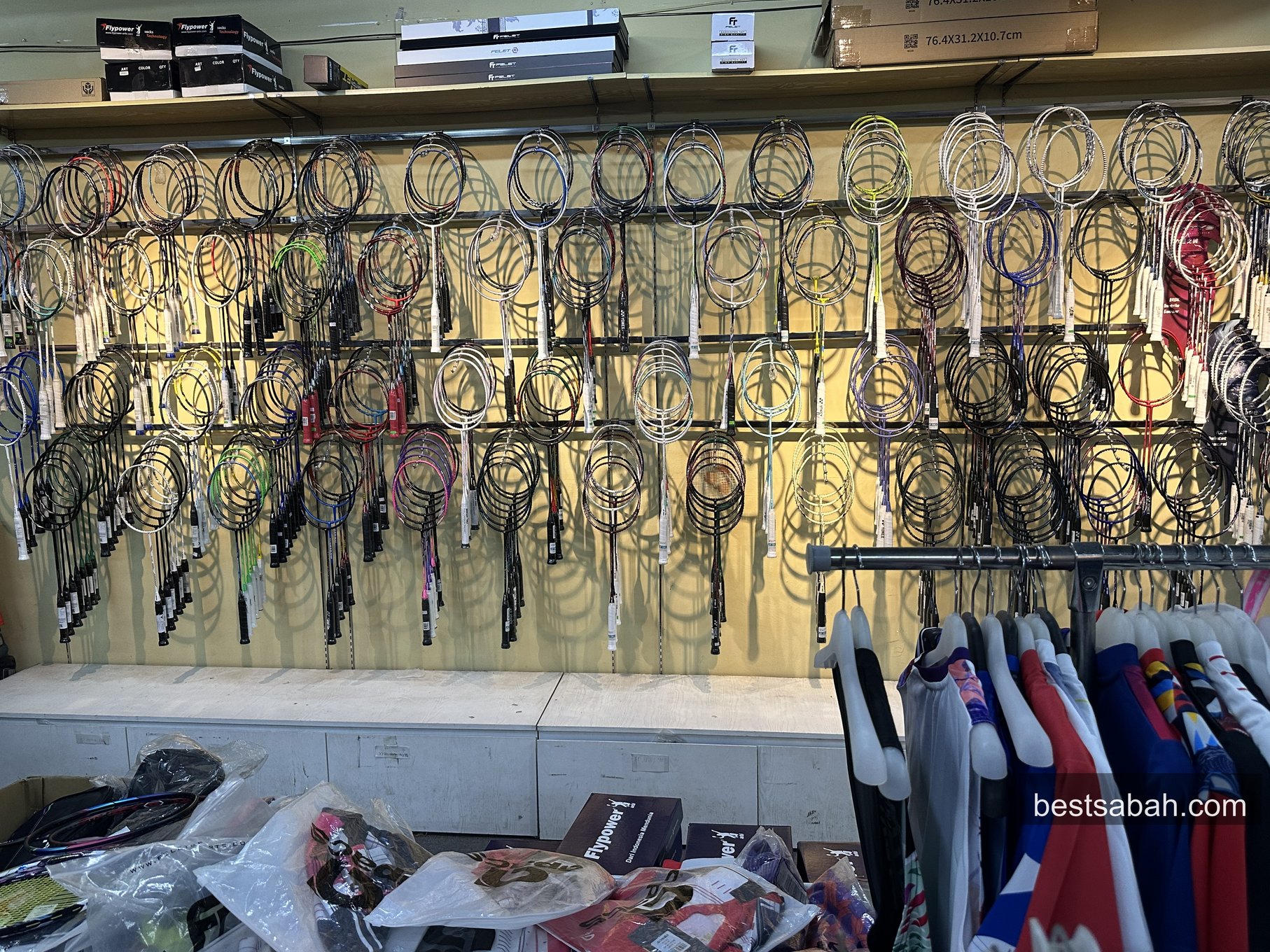 Wall of rackets and strings at AST Sports Centre Kota Kinabalu