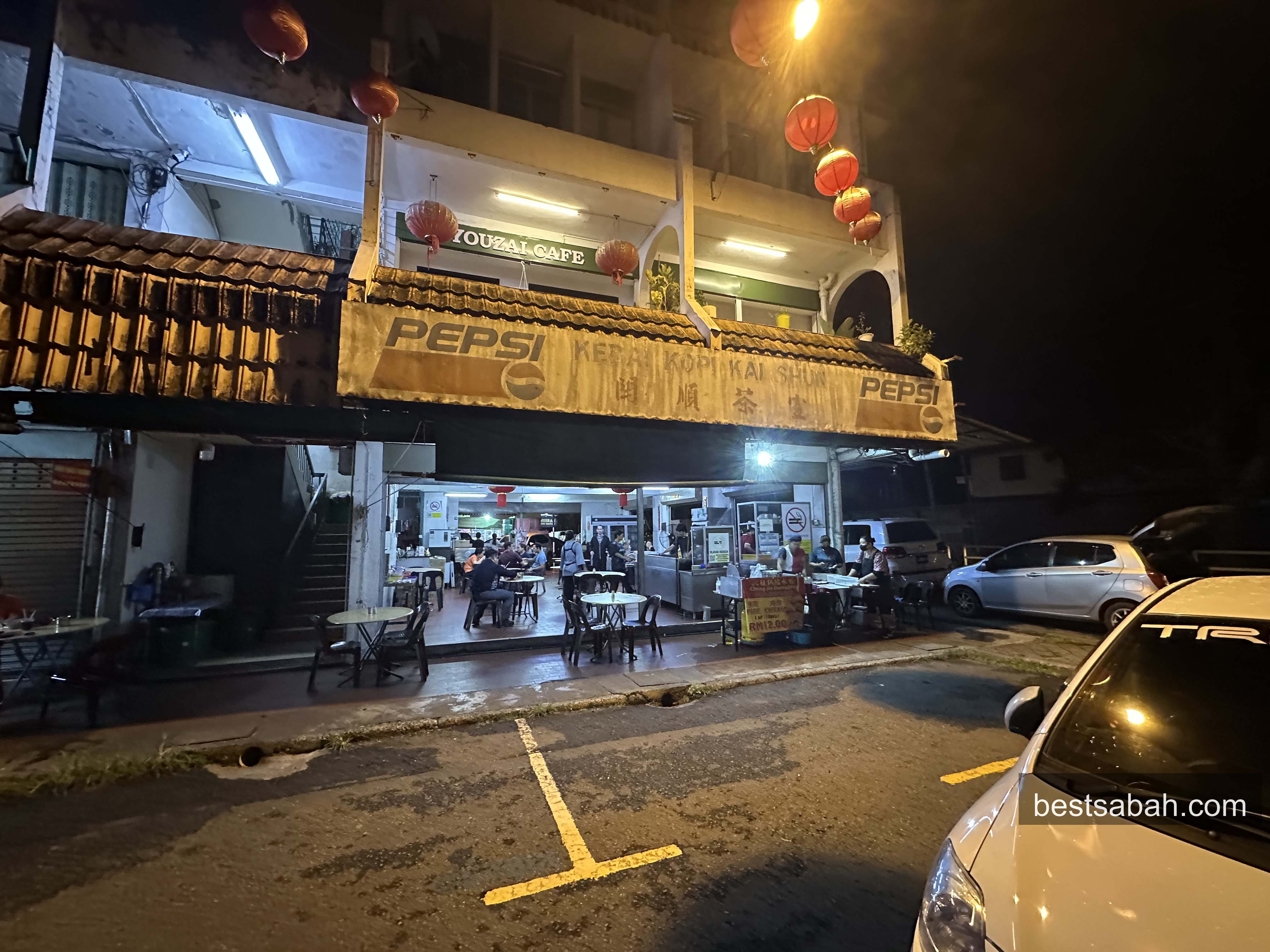 Kedai Kopi Kai Shun kopitiam at night in Foh Sang, Kota Kinabalu, with red lanterns