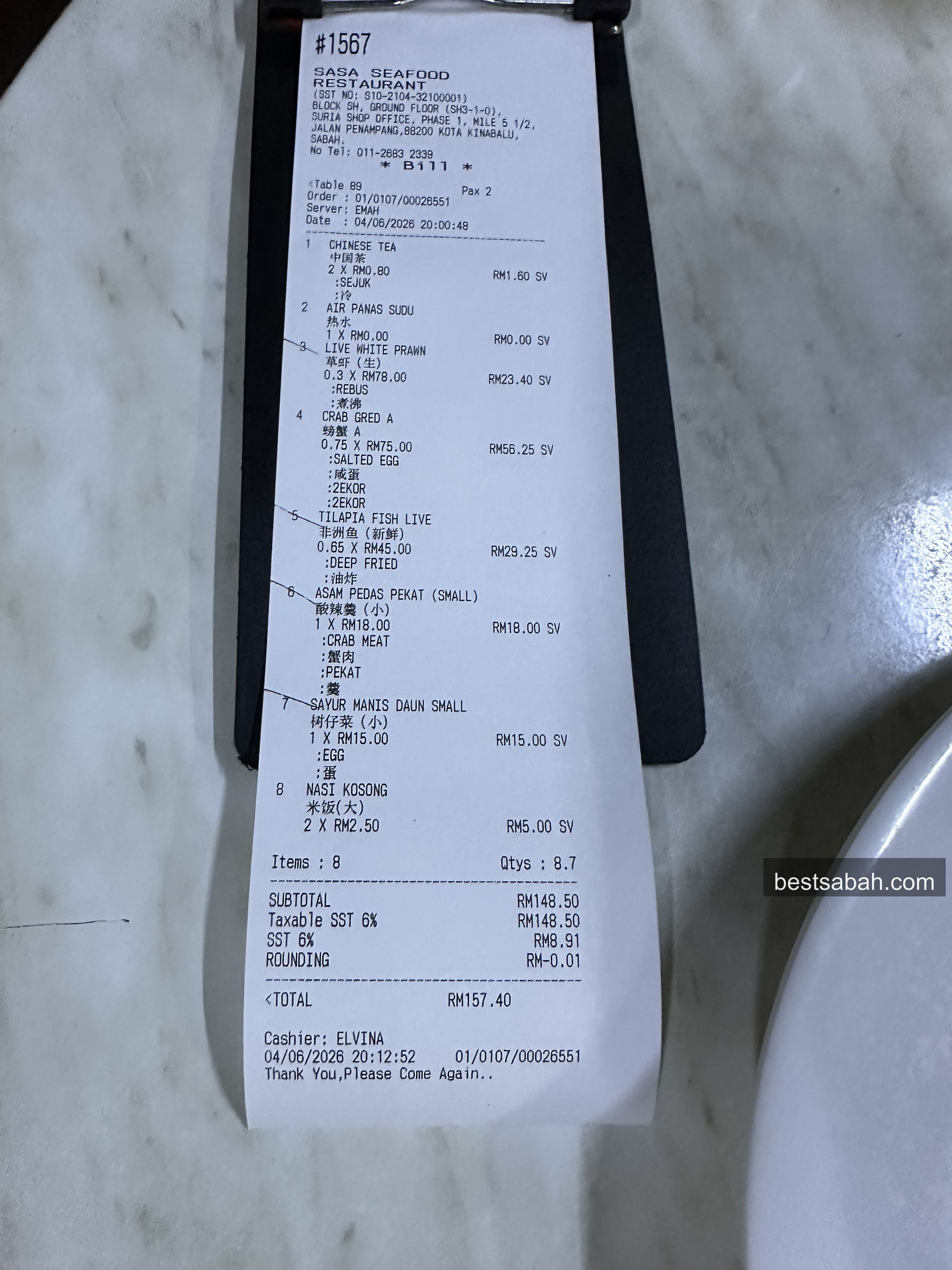 Receipt from Sasa Seafood Restaurant showing RM157.40 for four people
