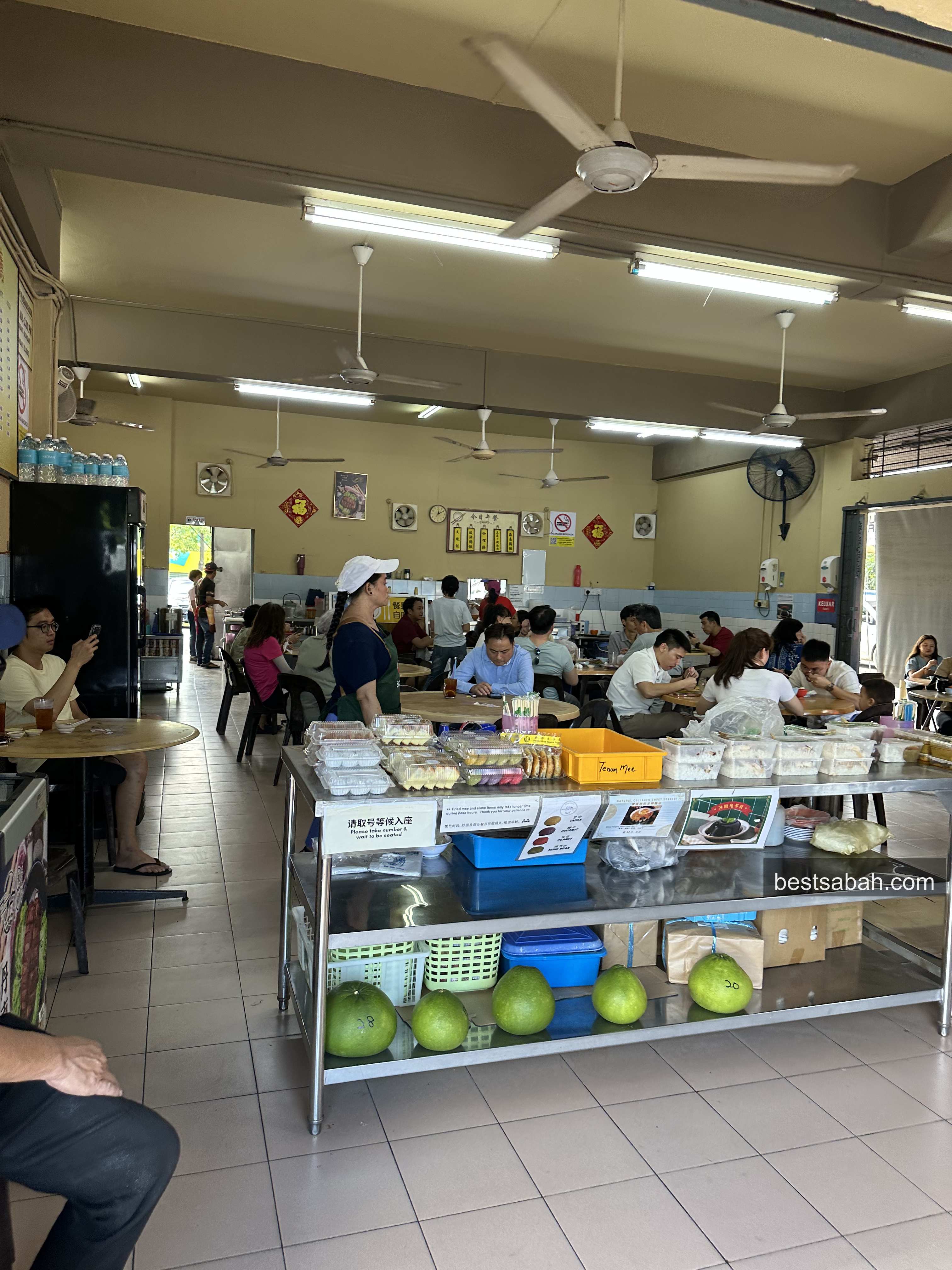 Busy interior of Towering Tenom Mee during the morning rush in Kota Kinabalu