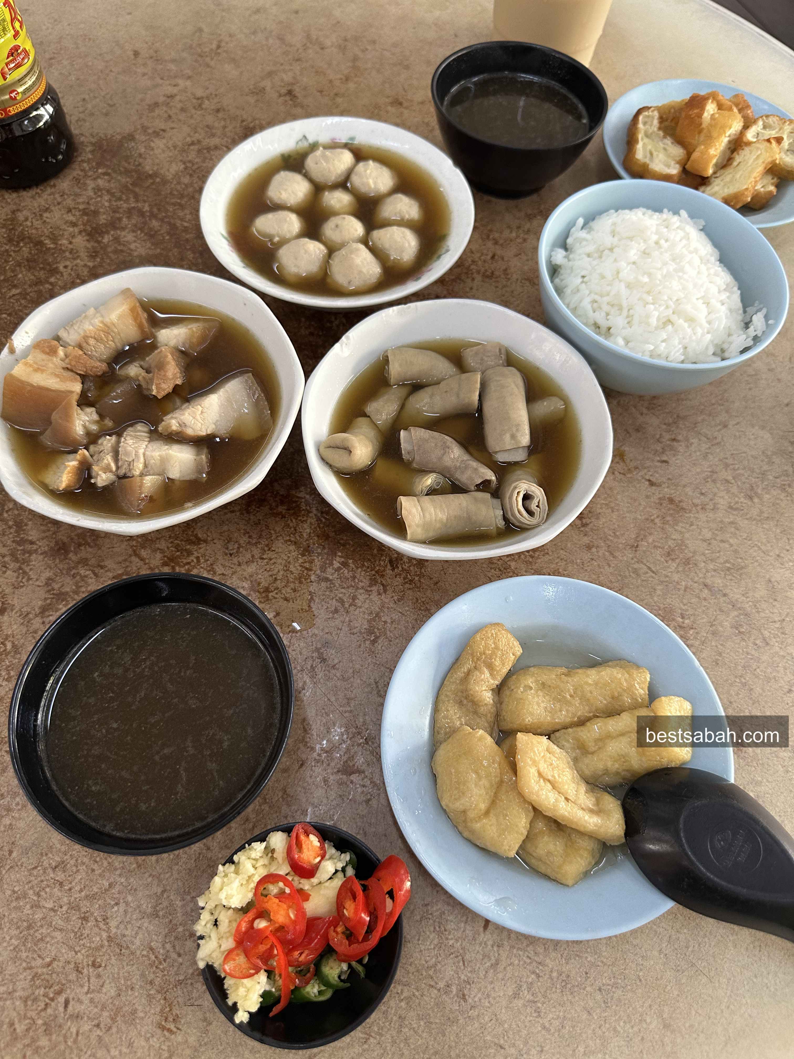 Yu Kee Bak Kut Teh spread with pork belly, meatballs and yau char kwai